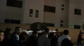 Mourners attend the funeral of Palestinian Hanan Abbas, 18, who died today of his injuries sustained during clashes with Israeli forces a few days ago,