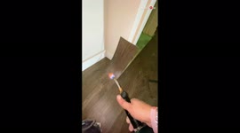 'Flooring specialist shows a SMART way of installing vinyl tiles on floors '