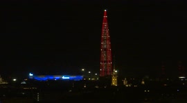 Lakhta tower lit up in red, that represents a symbol of holy fire, as the orthodox celebrate Easter, St Petersburg, Russia