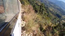 One miss and it's over: Brave bus driver navigates hair-raising mountain path in Nepal