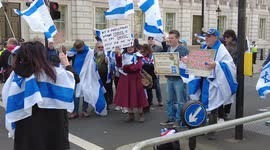 . Pro-Israelis on the other side against Palestinian and supporters rally