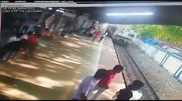 CCTV footage captures moment train derails and climbs platform