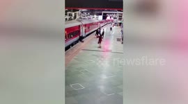 Daring cop pulls out man from jaws of death after latter slips boarding moving train in western India