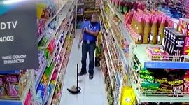 Confused worker searches for broom after unkowingly tucking it under his arm