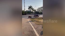 Students ride to school on modified bullock cart in Thailand
