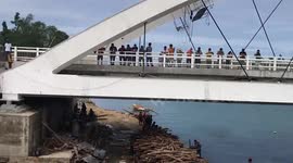 Rescuers search for survivors after bridge collapses in the Philippines killing four people