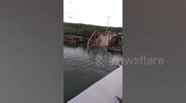 Mangled wreckage of bridge that collapsed in the Philippines killing four people
