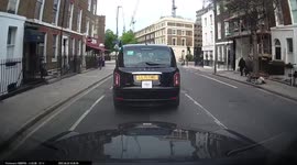 Careless riding by cyclists crashes into the back of a car in the busy capital of london