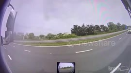 Watch the moment 20 mattresses blew off the back of a truck on a busy motorway