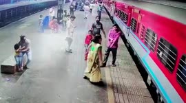 Alert cop pulls out man after he slips between train and platform in western India