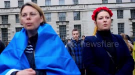 A  young flower sings for the ukriane .  central london rally uk