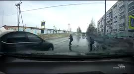Car misses kids crossing road by matter of inches in central Russia