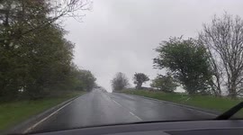 Heavy rain on the road near Skipton North Yorkshire UK