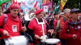 May day returns ,  to central london with of course the internationale , performed by the Stroud red band  .