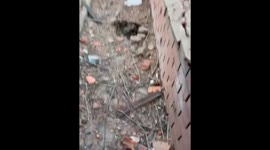 A street with terrible destruction after an airstrike in Mariupol