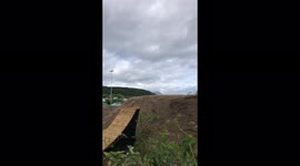 Bike rider doing trick with his bike - backflip and lands it perfectly