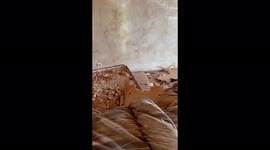 An apartment with terrible damage after an airstrike in Mariupol