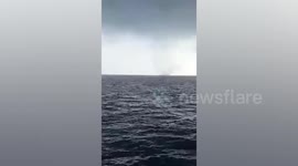 Scary waterspout forms off central Philippines coast