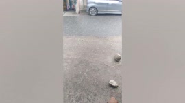 Hail stones batter homes during tropical storm in Muse, Myanmar