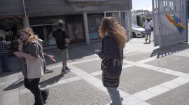 Lady mayor Kirsty Edwards  runs to help as Gay celebration festival evacuated after Restaurant catches fire. Hundreds evacuated from event square Falmouth