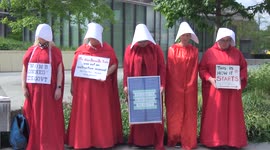 Abortion supporters wear 'Handmaid's Tale' costumes at protest outside US Embassy in London