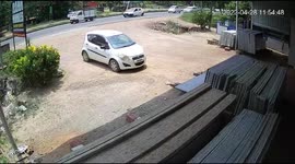 Riderless motorcycle speeds through traffic and smashes into signboard