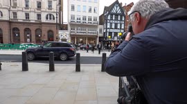 Coleen Rooney, wife of Derby County manager Wayne Rooney(R), arrives at the Royal Courts of Justice.