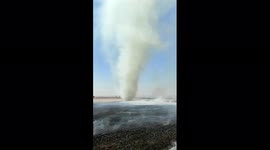Stunning twister swirls at airport in southern Russia