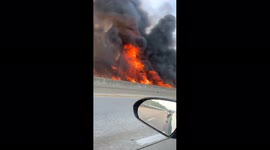 Overturned semi catches fire on I-264 near Taylorsville Road in Louisville