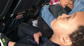 Boy scared on airplane