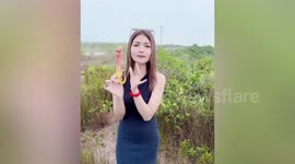 Government warns women to stop playing with phallic-shaped 'penis' flowers in Cambodia