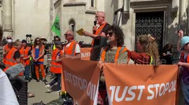 Just Stop Oil protest in solidarity with jailed activists outside Royal Courts of Justice, London