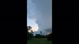 Watch amazing cumulonimbus cloud producing lightning over the famous Wakita water tower.