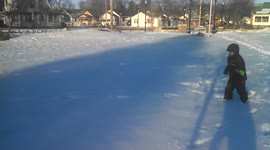 Boy falls in snow