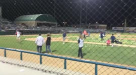 Man proposes at baseball field