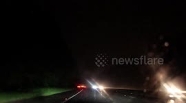 Heavy rain and lightning storm over the M25 at Orpington, UK
