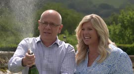 UK's biggest ever lottery winners celebrate £184m by spraying Champagne