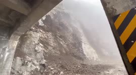 Worker flees massive landslide crashing down highway in Taiwan