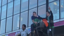 Irish fans hang off famous Wembley statue (2)