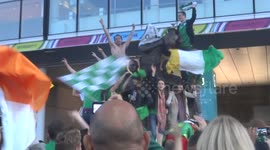Irish fans hang off famous Wembley statue