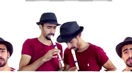 Man freestyle beatboxes with recorder