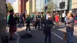 Irish Rugby fans welcomed by Scottish Piper