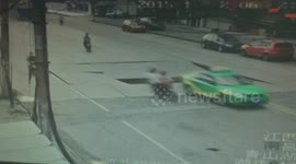 Road collapses as cars drive over it