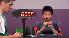 Chan Hong Lik 7 yrs old solves rubik's cube 8.76 sec