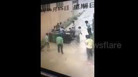 Dozens of people climb out of rollover rickshaw