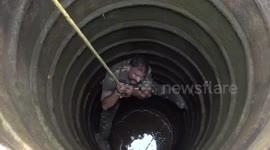 Forest officials rescue snake from well in eastern India