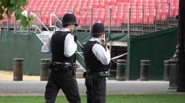 Police guard scene of stand collapse at Major Generals Review in Horse Guards Parade