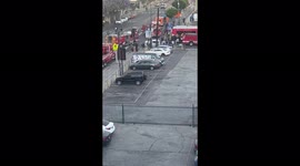 MTA bus hit motorcycle person stuck underneath