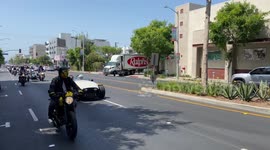 Hundreds of bikers cruise through LA for 'Distinguished Gentleman's Ride' charity event