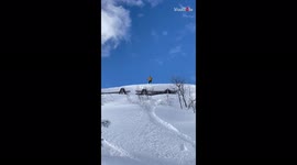 'Snowboarder triggers small avalanche after one of his drops doesn't go according to plan '